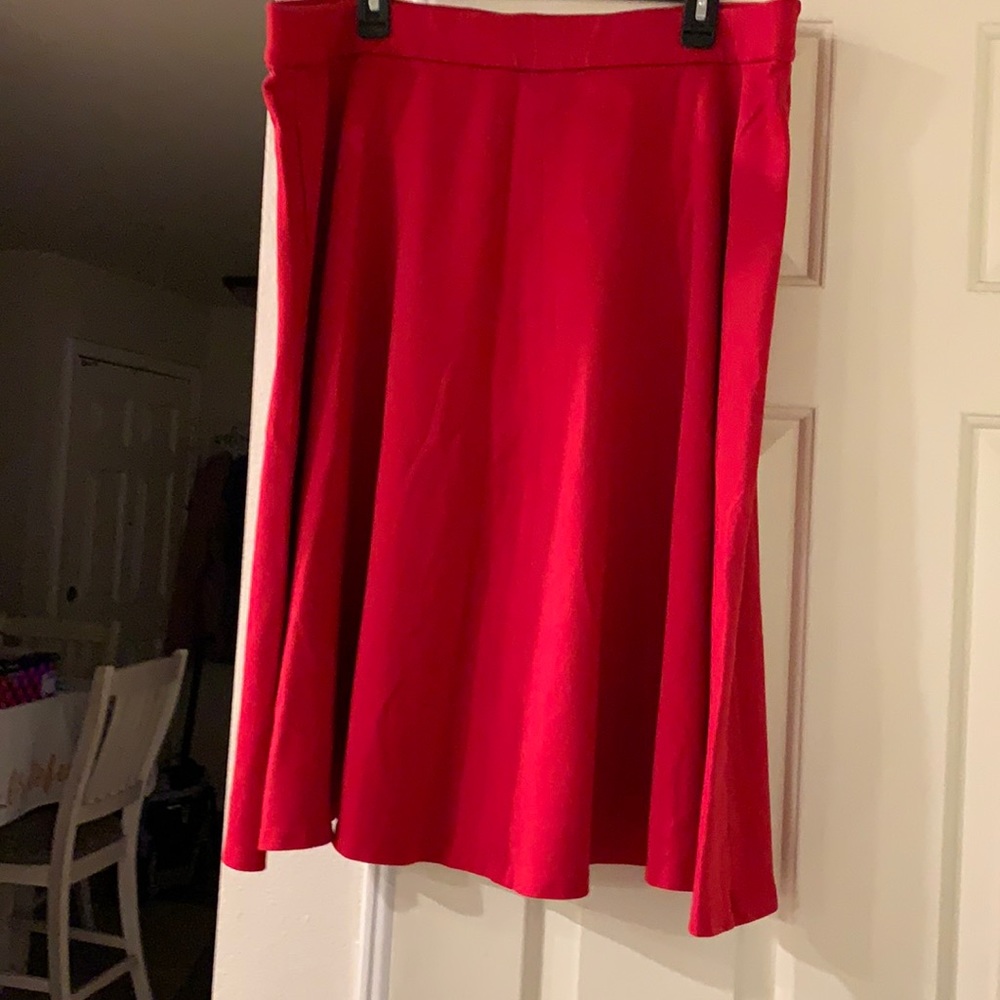 Red skirt (thicker material) rayon/spandex/nylon